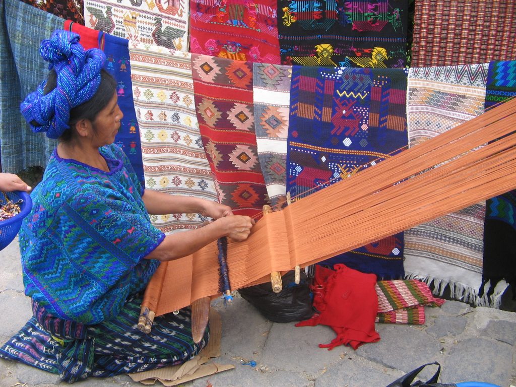 A 'backstrap' loom in action Courtesy: https://tictail.com/blog/tictail-store-of-the-week-medium/