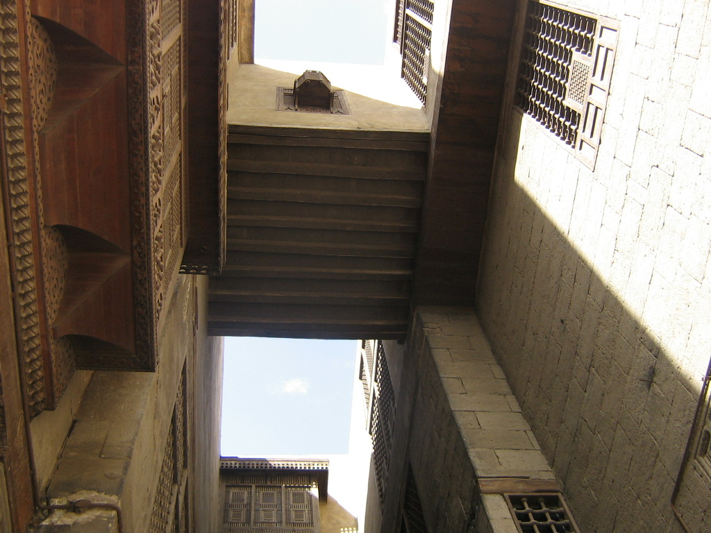 The two houses are joined by a bridge at the third floor