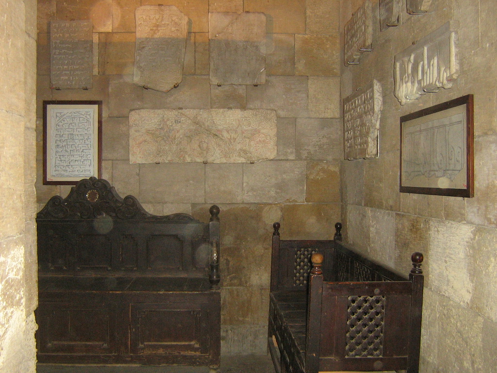 A wall- mounted group of marble funerary inscriptions (Both Coptic and Islamic) which include good examples of 9th century work with Kufic lettering.