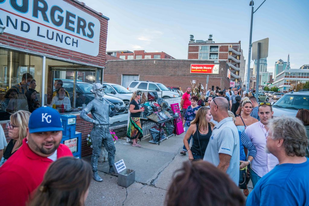 Artists and performers line up during First Friday’s at the Crossroads