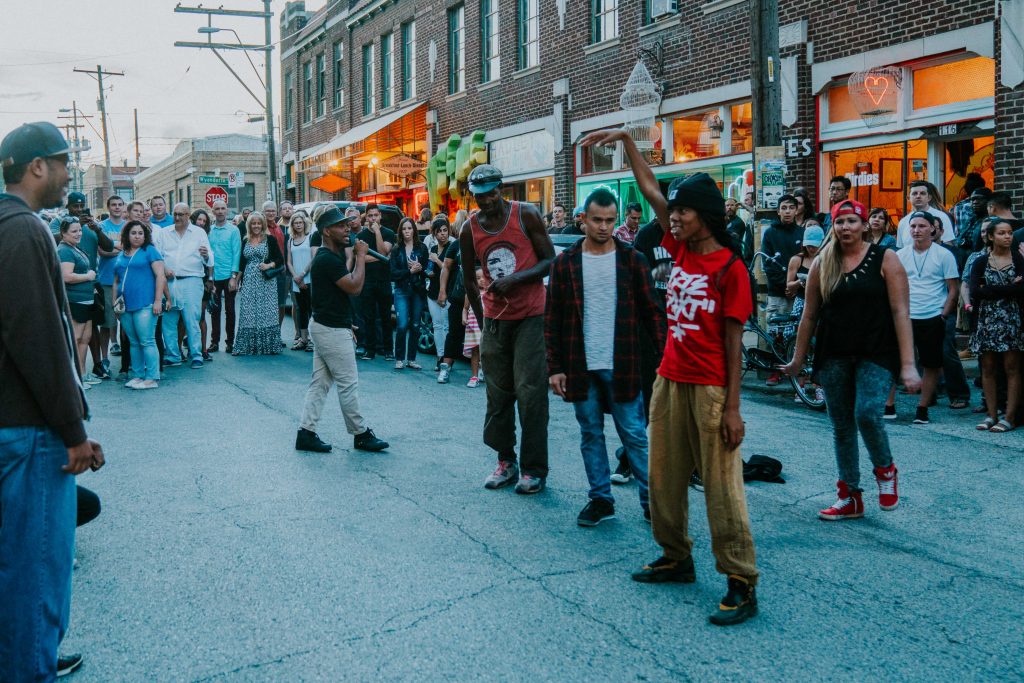 Street performers dance battling in the streets