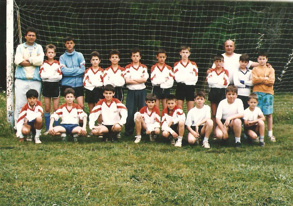 Local football team , juniors, the nineties (my brother in the front row , fourth from the right, my father in the last row from the right)