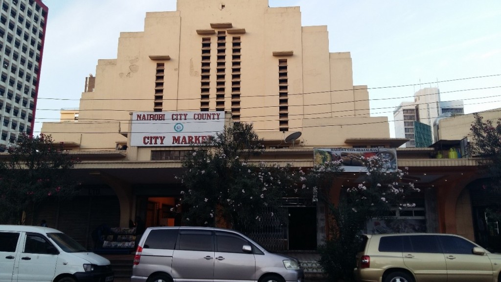The Entrance to Nairobi City Market showing the towering light brown building