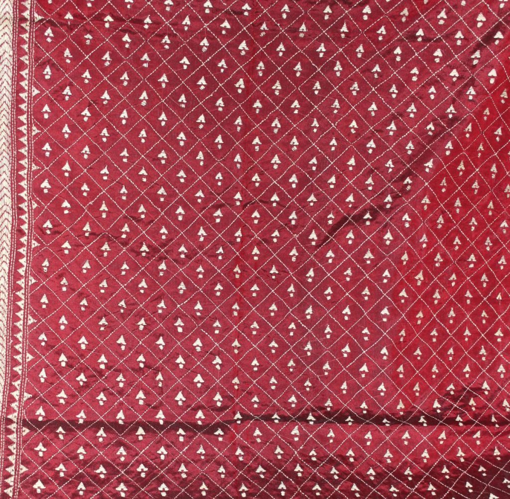 A fine example of reverse Kantha stitch. Photo credit: pagesofintegrity.files.wordpress