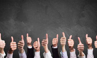 happy employees thumbs up - 123RF