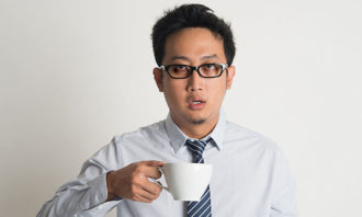 tired-Asian-businessman-123RF