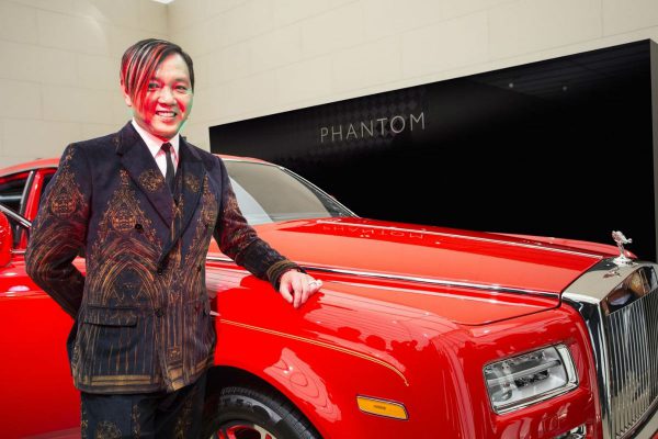 Hung specially flew to England to commission a fleet of 30 bespoke "Stephen Hung red" Rolls-Royce Phantoms for The 13 Hotel.