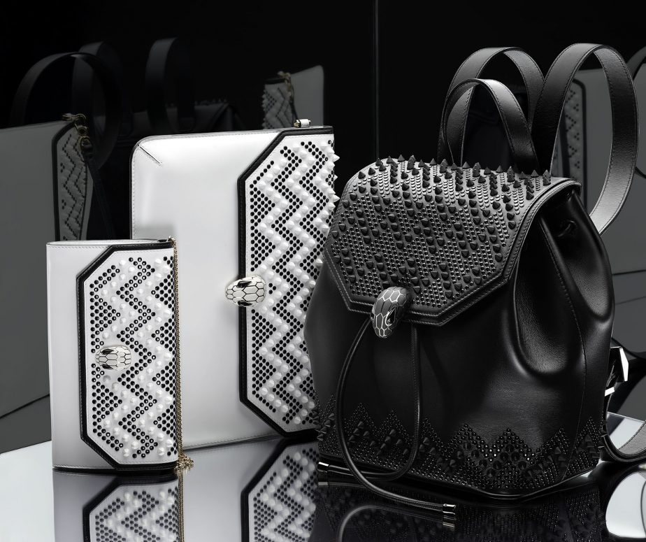 From left: Serpenti Forever Wallet on chain, Stud Chevron White Ceramic/Black/Calf leather Ceramic White; Serpenti Forever Envelope clutch, Stud Chevron White Ceramic/Black/ Calf leather Ceramic White/Light gold; Serpenti Forever Backpack, Stud Chevron black/Smooth calf leather black. Retail price: SG$1470, $1560 and $4330