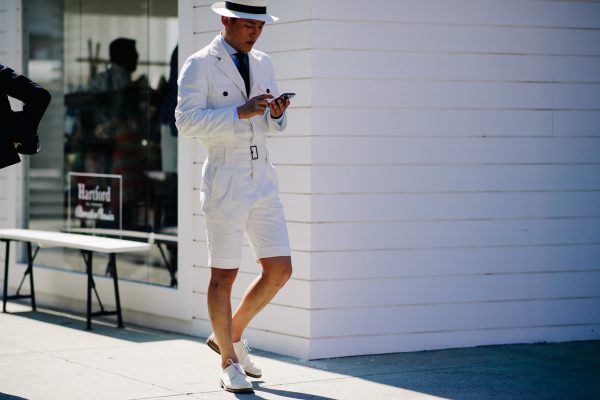 This shot of Pitti Uomo 92 by Adam Katz Sinding shows how men can pull of a smart-casual short suit with safari jacket.