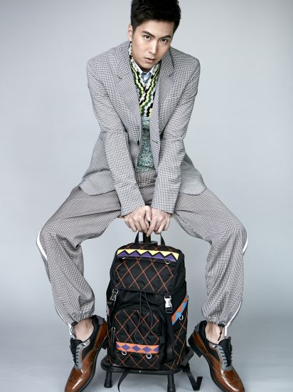 Here, this Prada cotton jacket - like the one Jude Law was wearing in the campaign visuals, is layered on a Prada wool vest, cotton shirt, pants, leather shoes and paired with their three tone leather shoes in brogues. The leather backpack is just icing on cake.