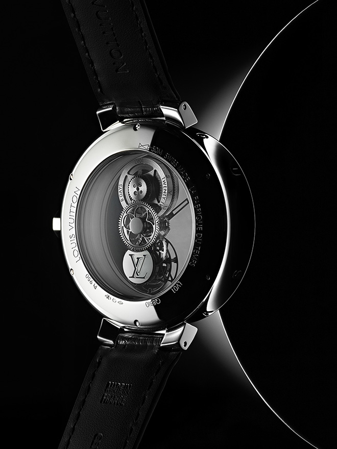 Tambour Moon Mysterieuse Flying Tourbillon adapts the principle of the mysterious calibre, used with ingeniously disguised sapphire discs and arranged in a line and combined with a flying tourbillon escapement