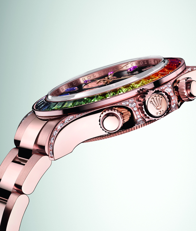 This latest 18 ct Everose gold Rainbow Daytona features a case adorned with 56 brilliant-cut diamonds set into the lugs and crown guard