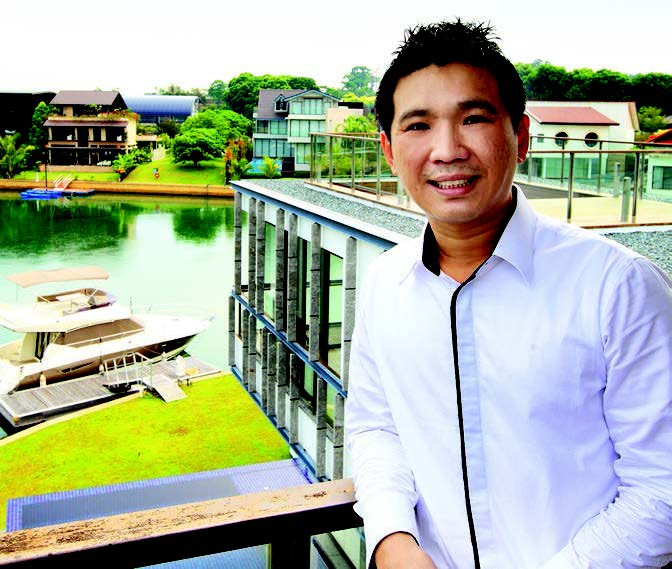 Steve Tay, associate director of Newsman Realty
