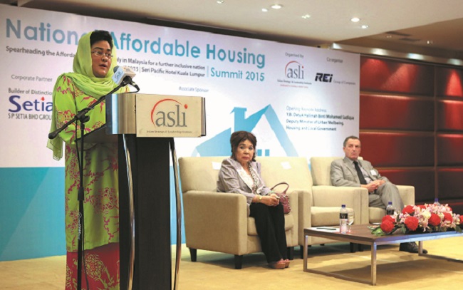 Halimah (left) giving her keynote address at the National Affordable Housing Summit 2015. Sharing the stage are Cheah and REI Group of Companies chief executive officer and co-founder Dr Daniele Gambero (Photo by Mohd Izwan Mohd Nazam)