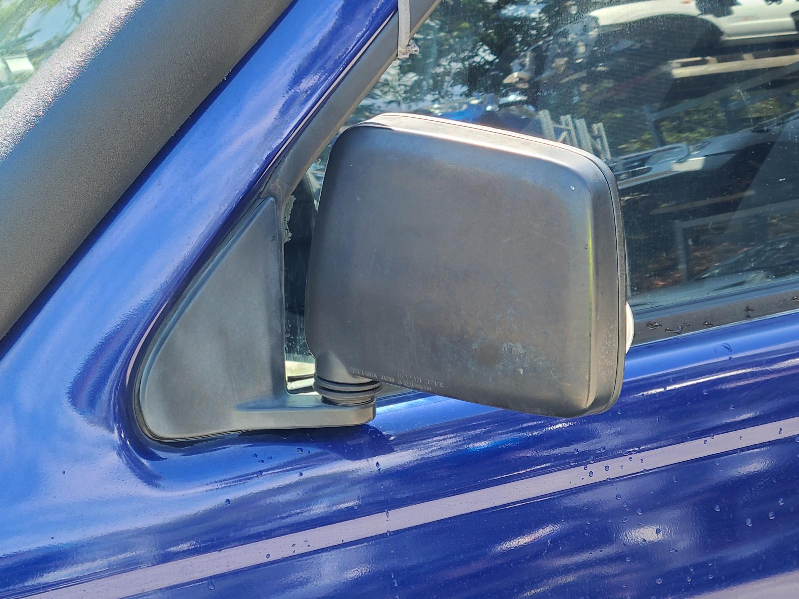 View Nissan Navara 2002 4 Door Utility