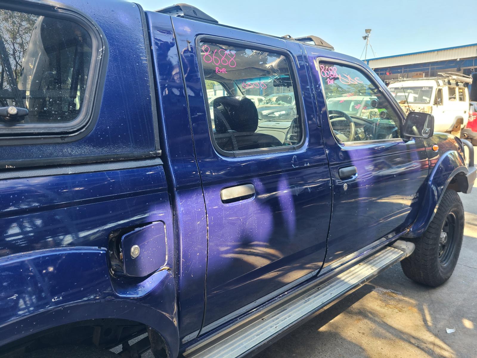 View Nissan Navara 2002 4 Door Utility