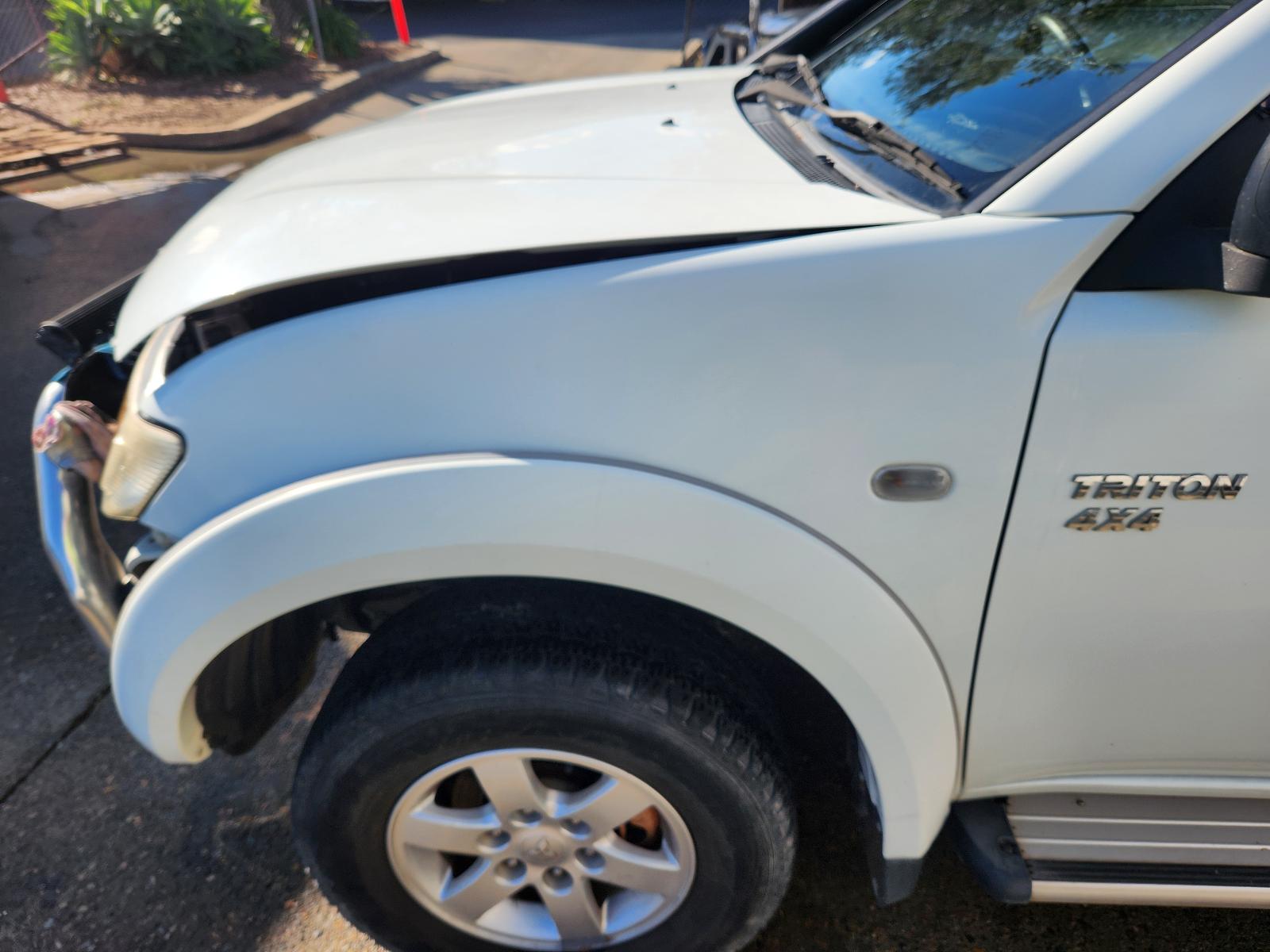 View Mitsubishi Triton 2012 4 Door Utility