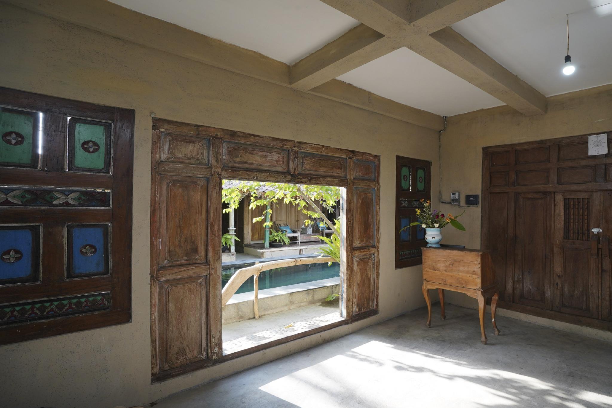 This is the image of the OYO 2523 Kayu Beach Villa #2