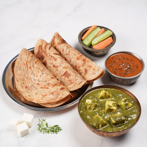 Palak paneer, dal makhani, parathas thali