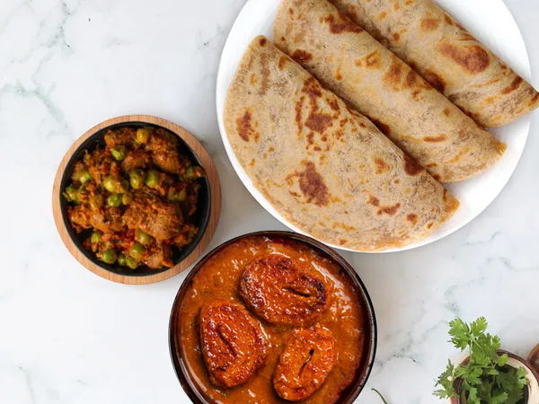Kadhai chaap, soya masala paratha thali