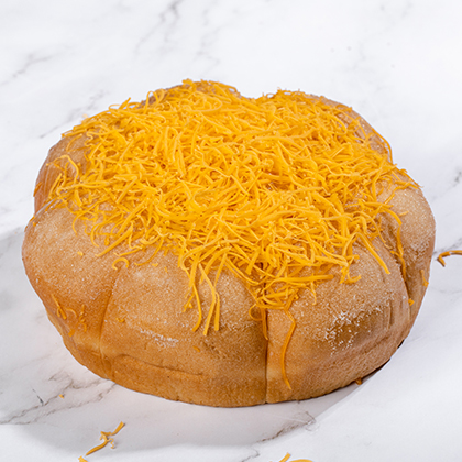 Treat yourself to a classic Ensaymada made with freshly-churned butter, savory cheese topped with sugar crystals