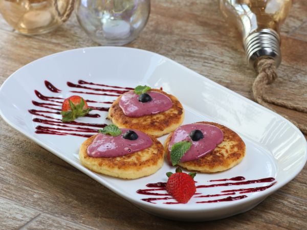 Russian Syrniki with Blueberry Sauce