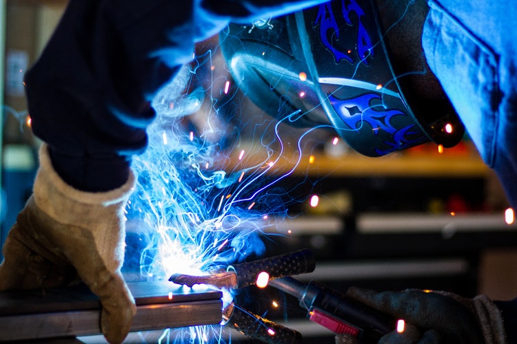 man working on a welding
