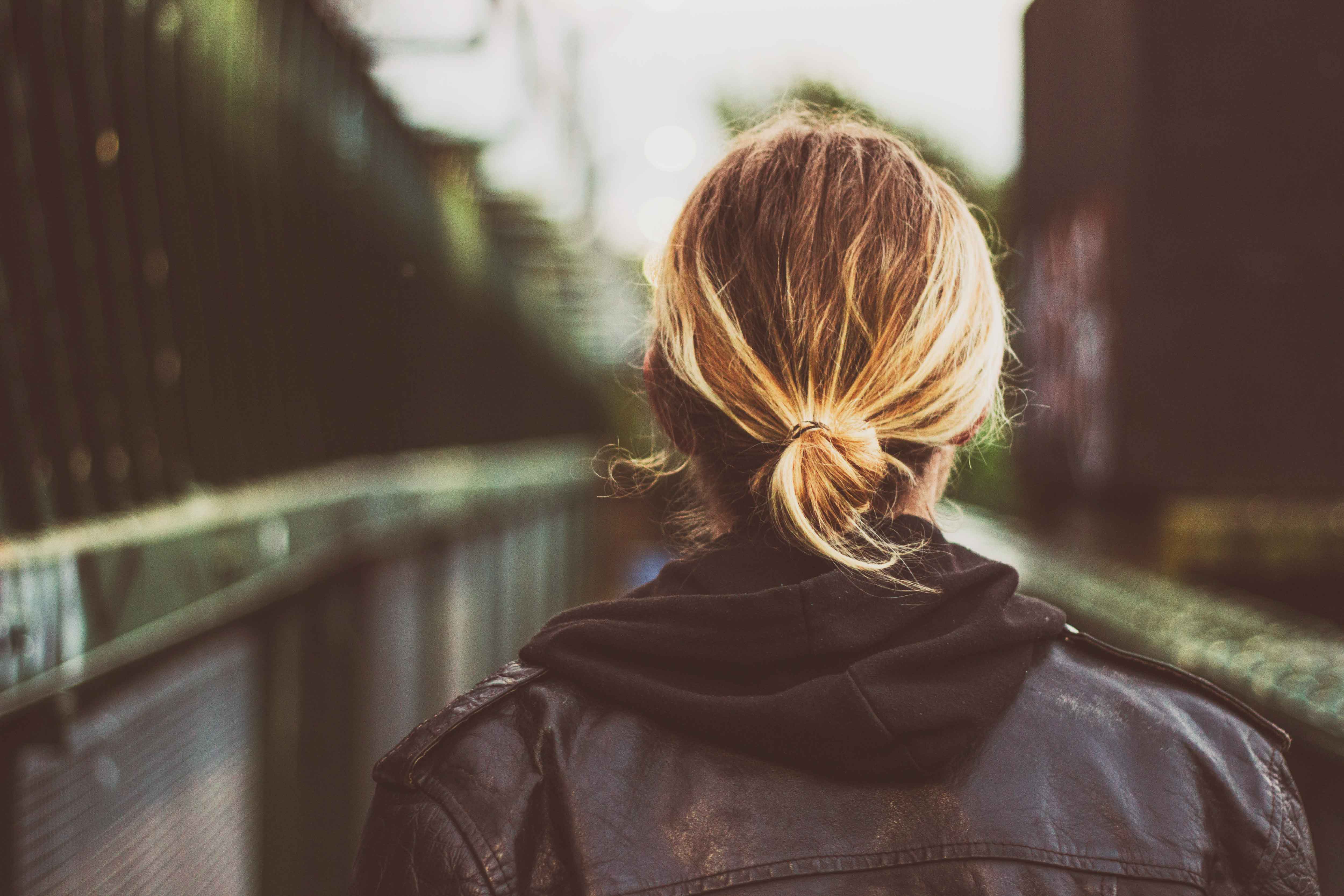 Back view of a woman looking onwards