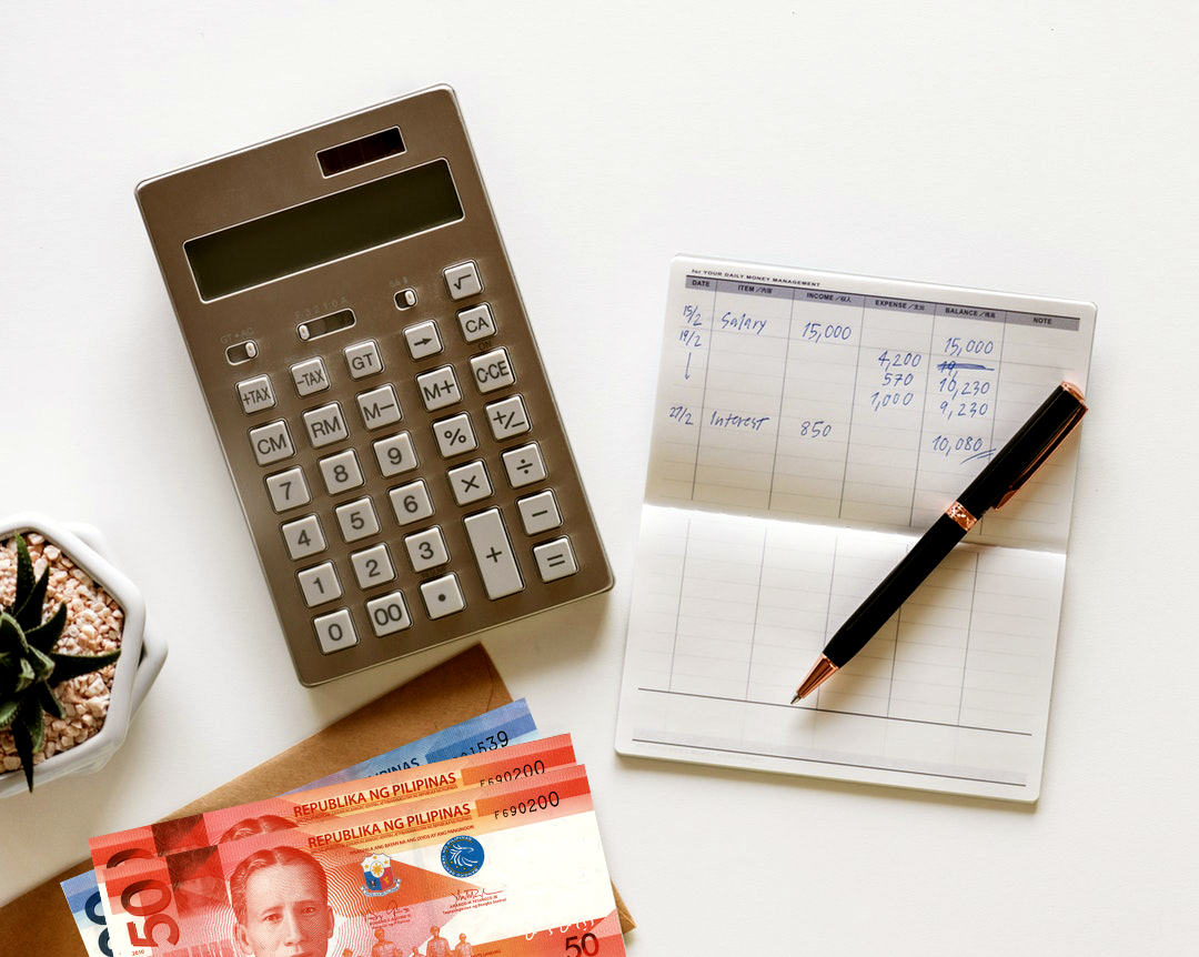 calculator, money, list of expenses, pen
