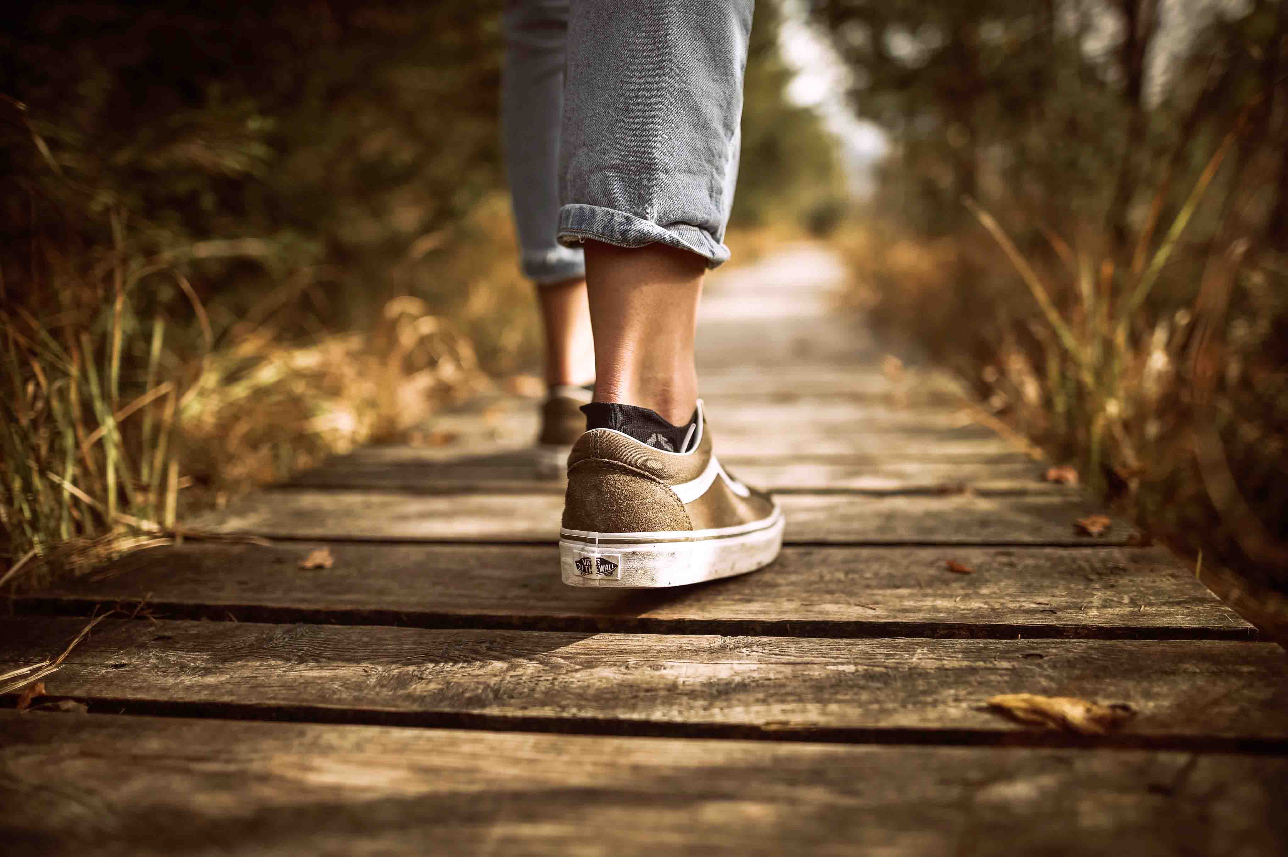 feet of walking person