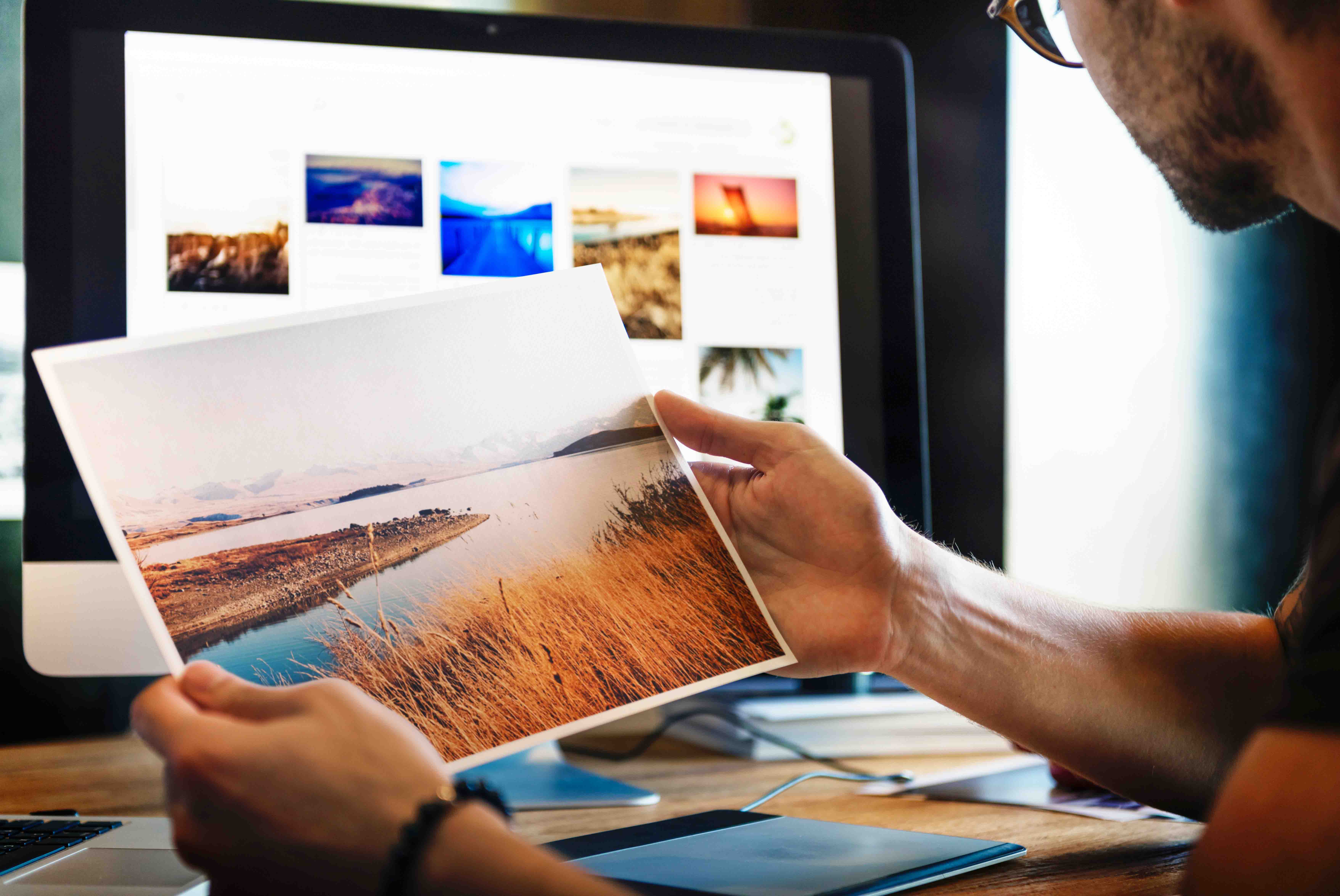 man holding a photo