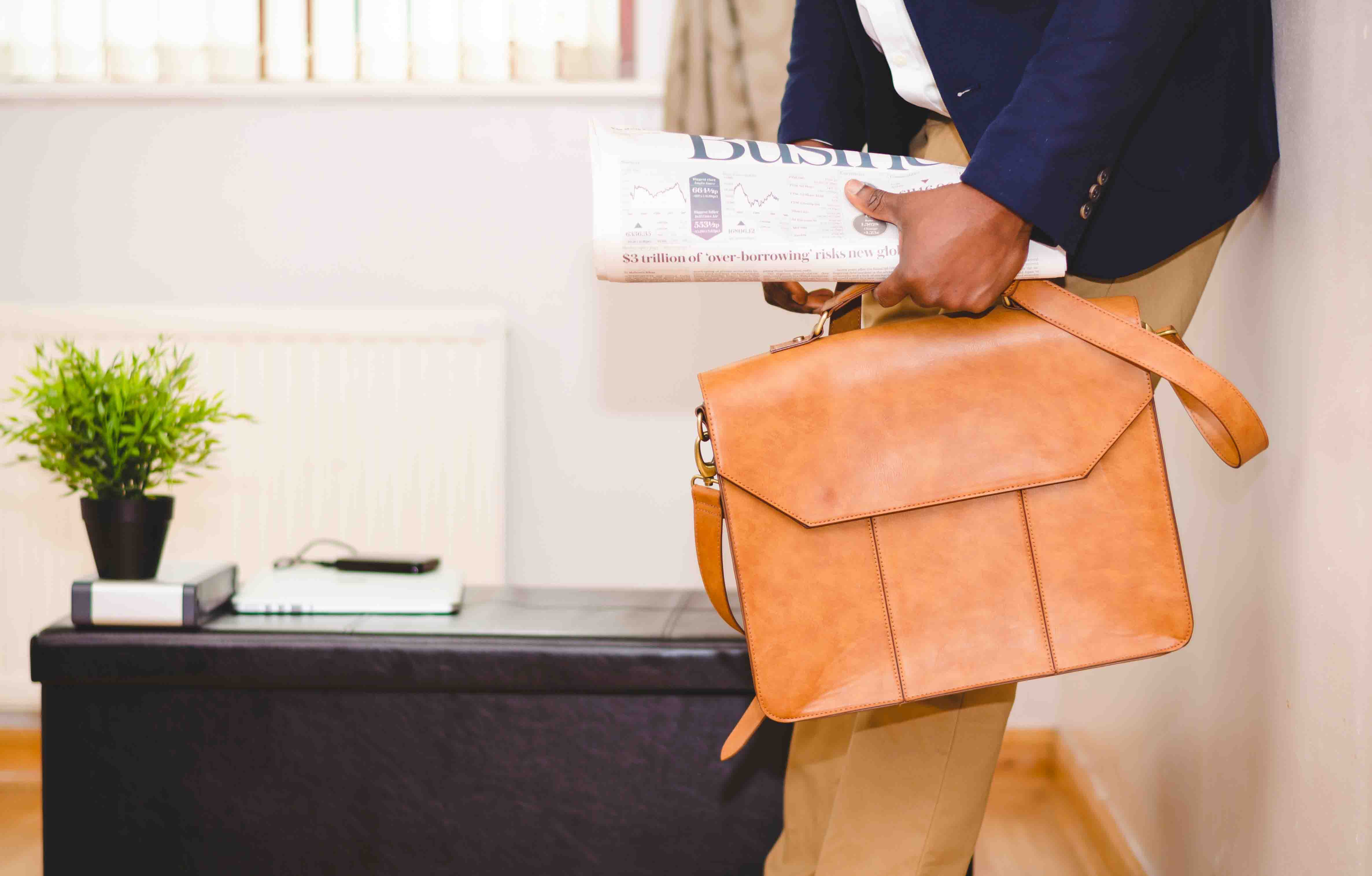 man holding a business case