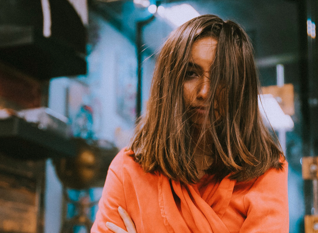 girl with hair covering her face