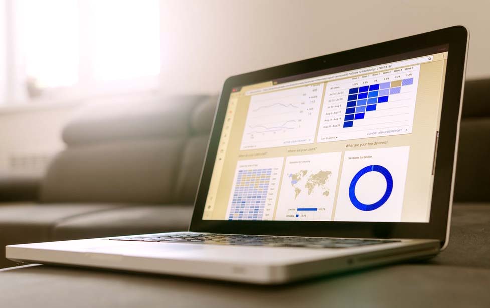 open laptop with charts