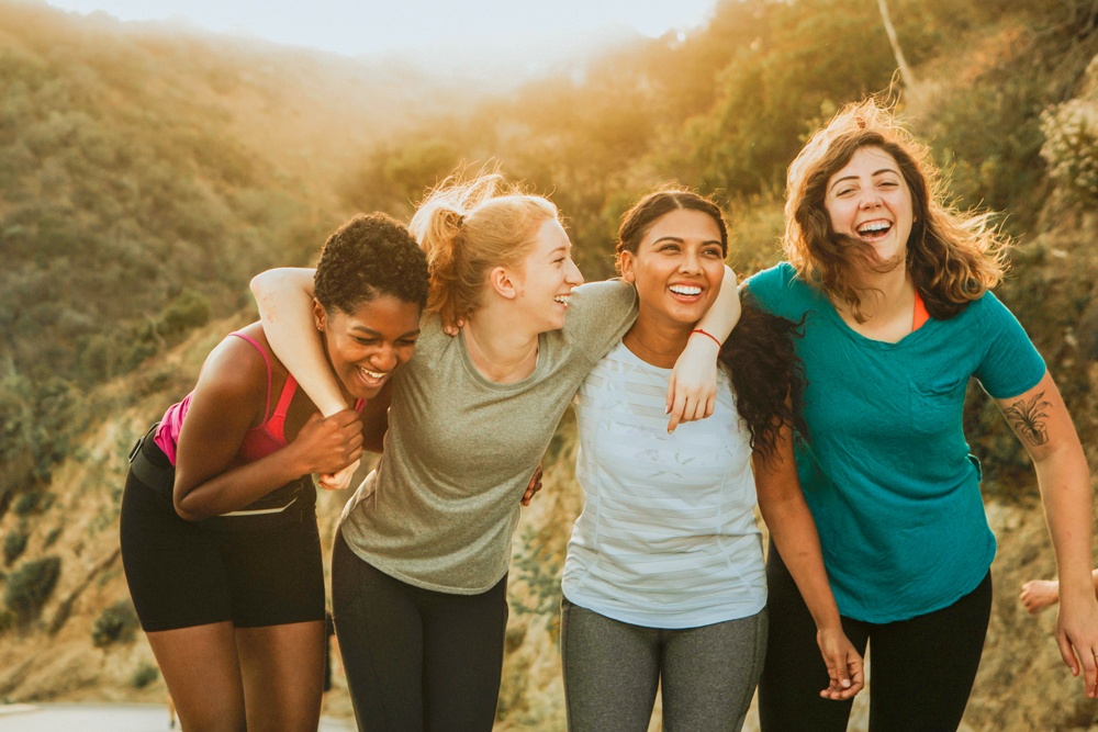 four women friends in a mountain