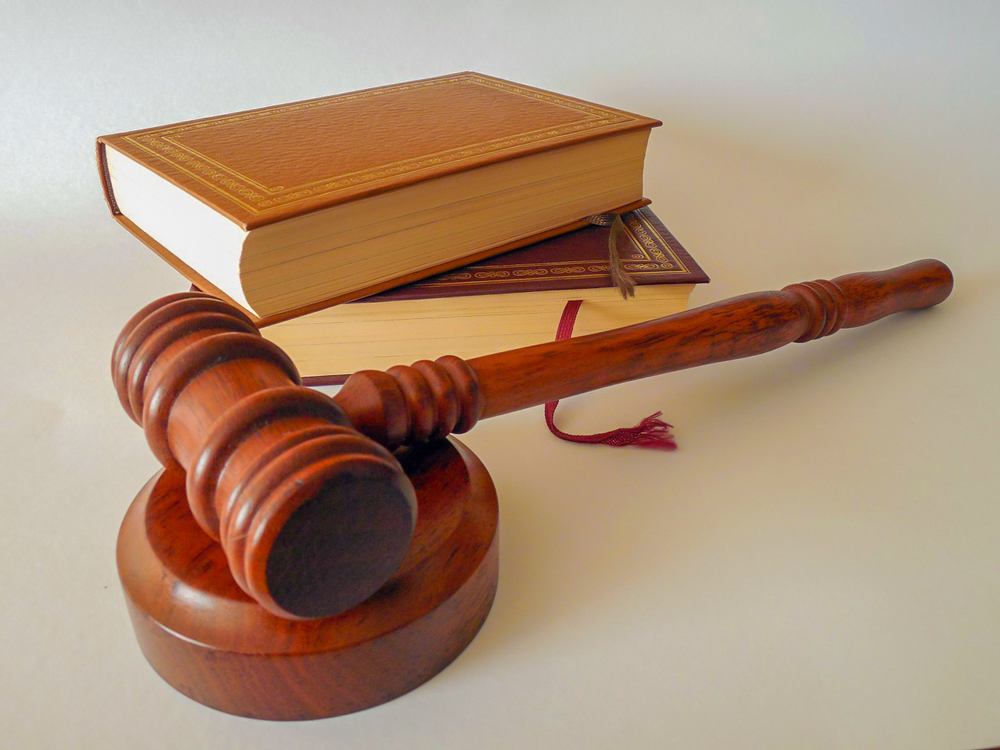 image of law books and a court hammer