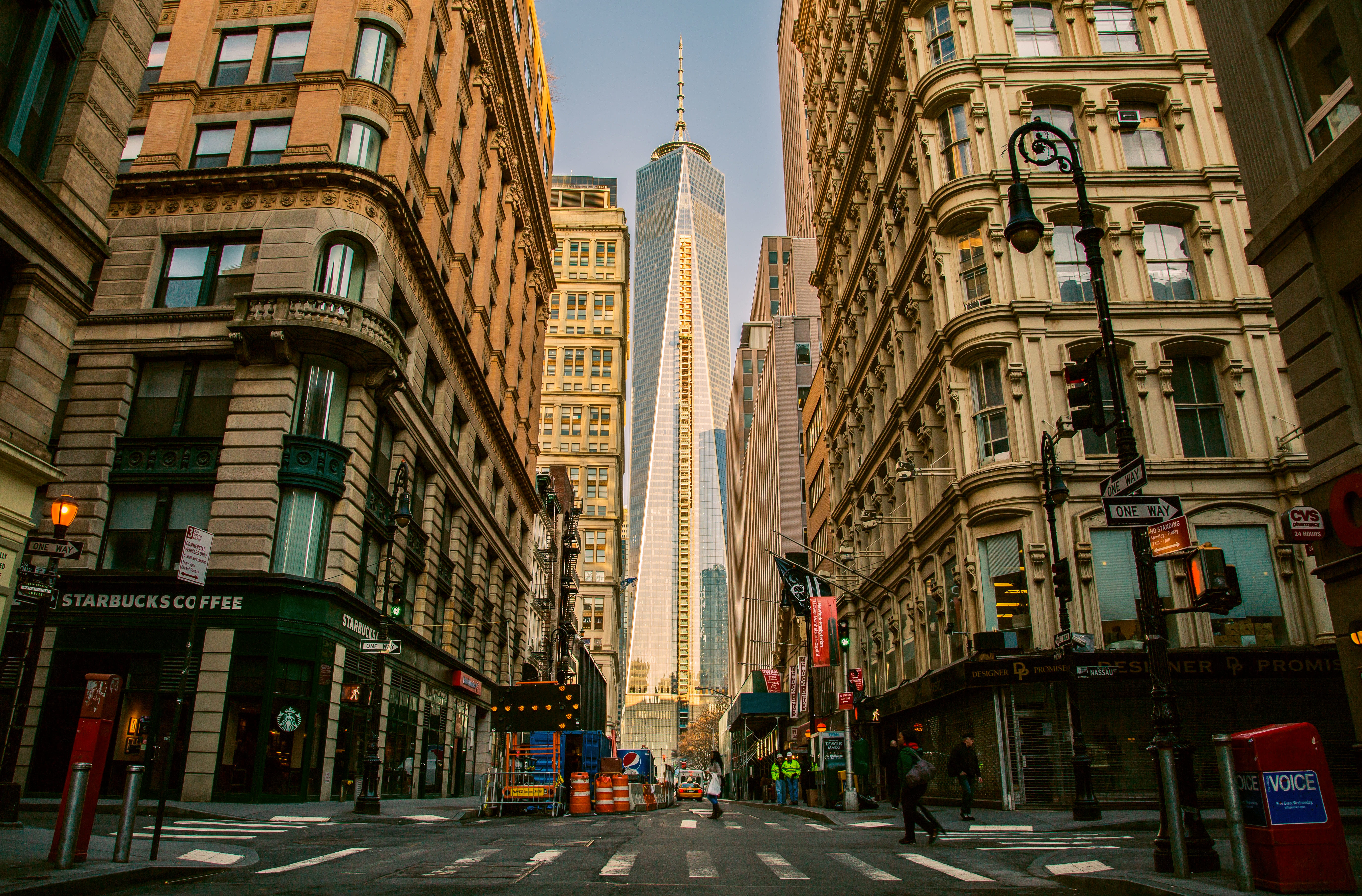 city streets with pedestrians and buildings