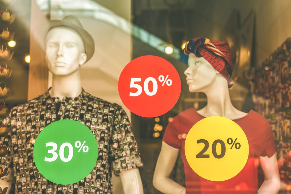Mannequins with money signs