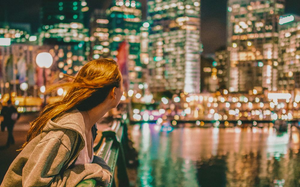 Girl on a boat along the harbor; Sydney, Australia