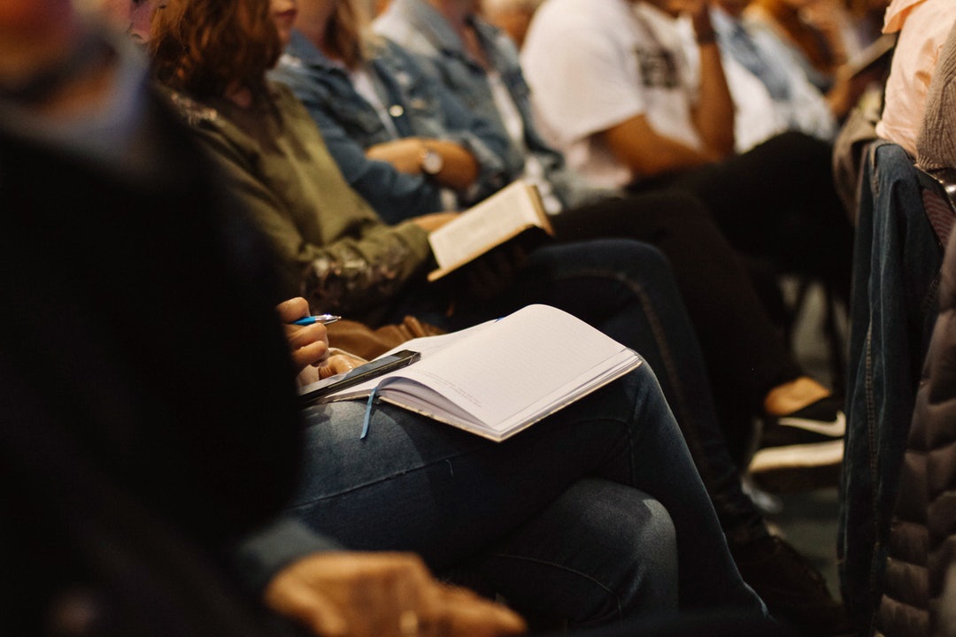 Students sitted in an auditorium
