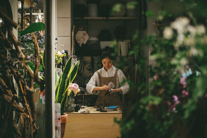 Woman in her floral shop