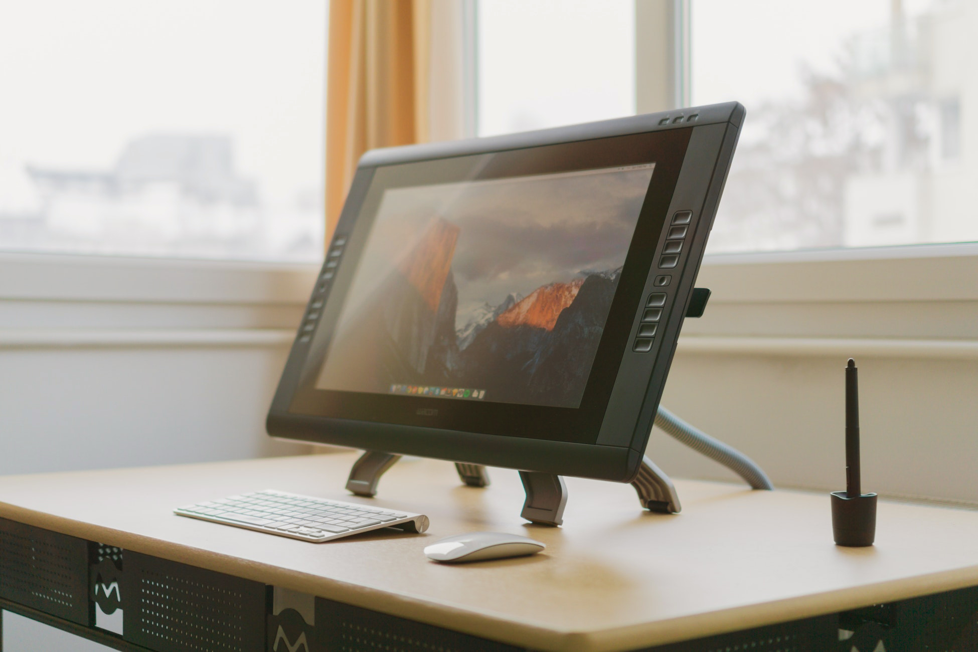 Internships for creative students: a graphic designer's tablet on a desk
