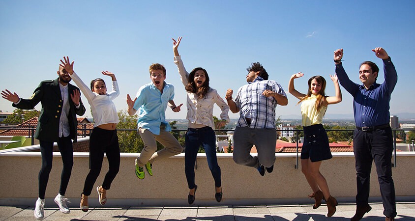 Saint-louis-university-madrid-students-jumping