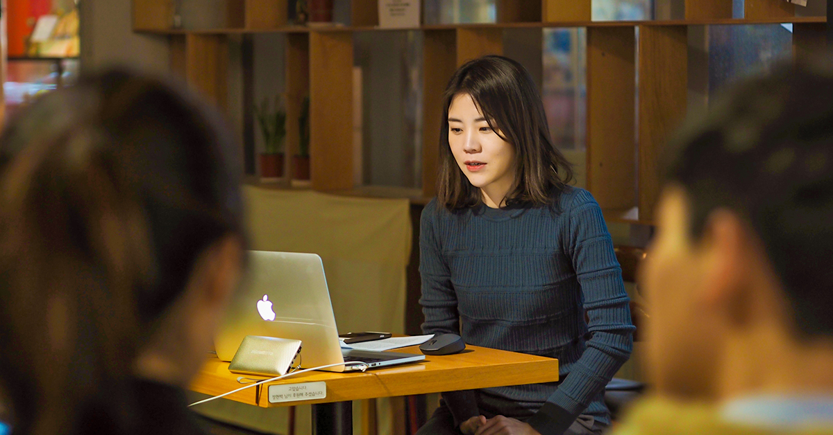 girl looking at laptop
