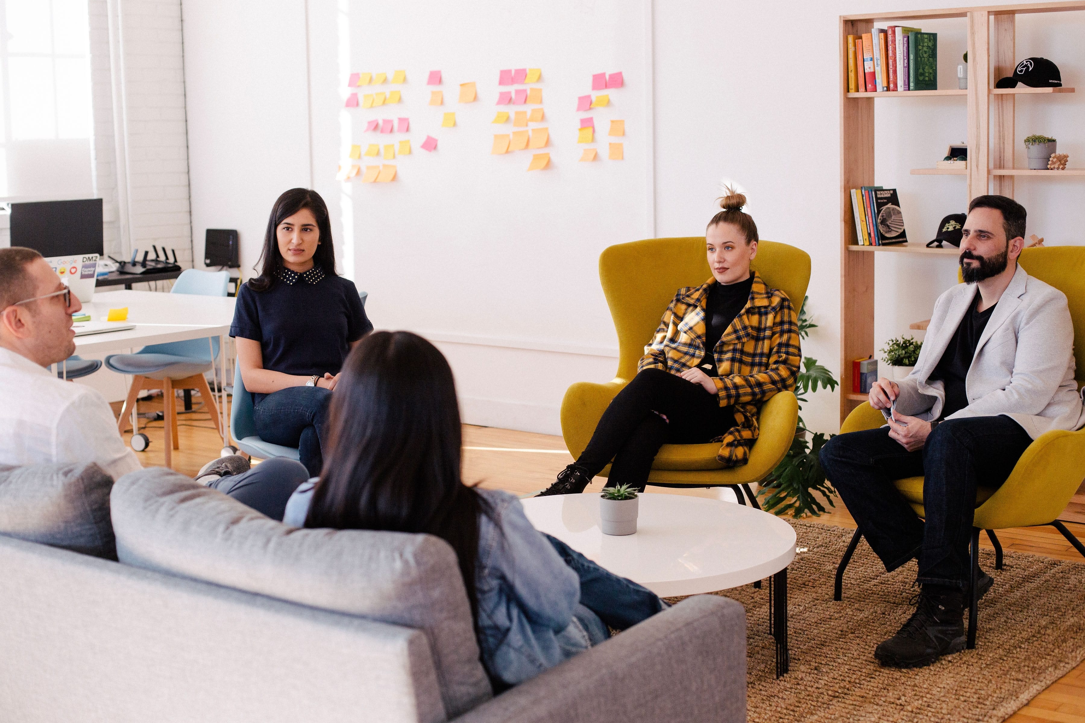 group of young professionals gathered together