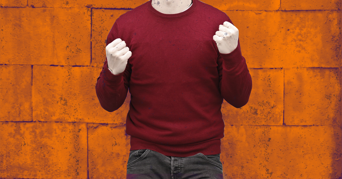 man with curled fists, frustrated about leadership