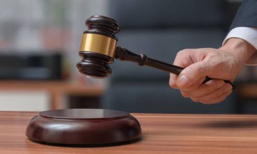 
The Burden of Proof of proving that a piece of land was voluntarily surrendered falls on the Panchayat or the Municipality claiming it.
