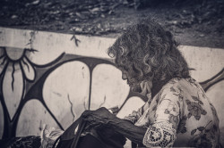 An old woman Search something