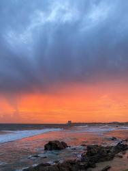 බැස යන දැවෙන හිරු - The Burnished Sunset