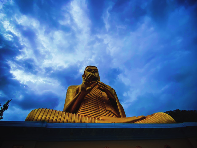 Golden Lord buddha statue of rangiri dambulu viharaya
